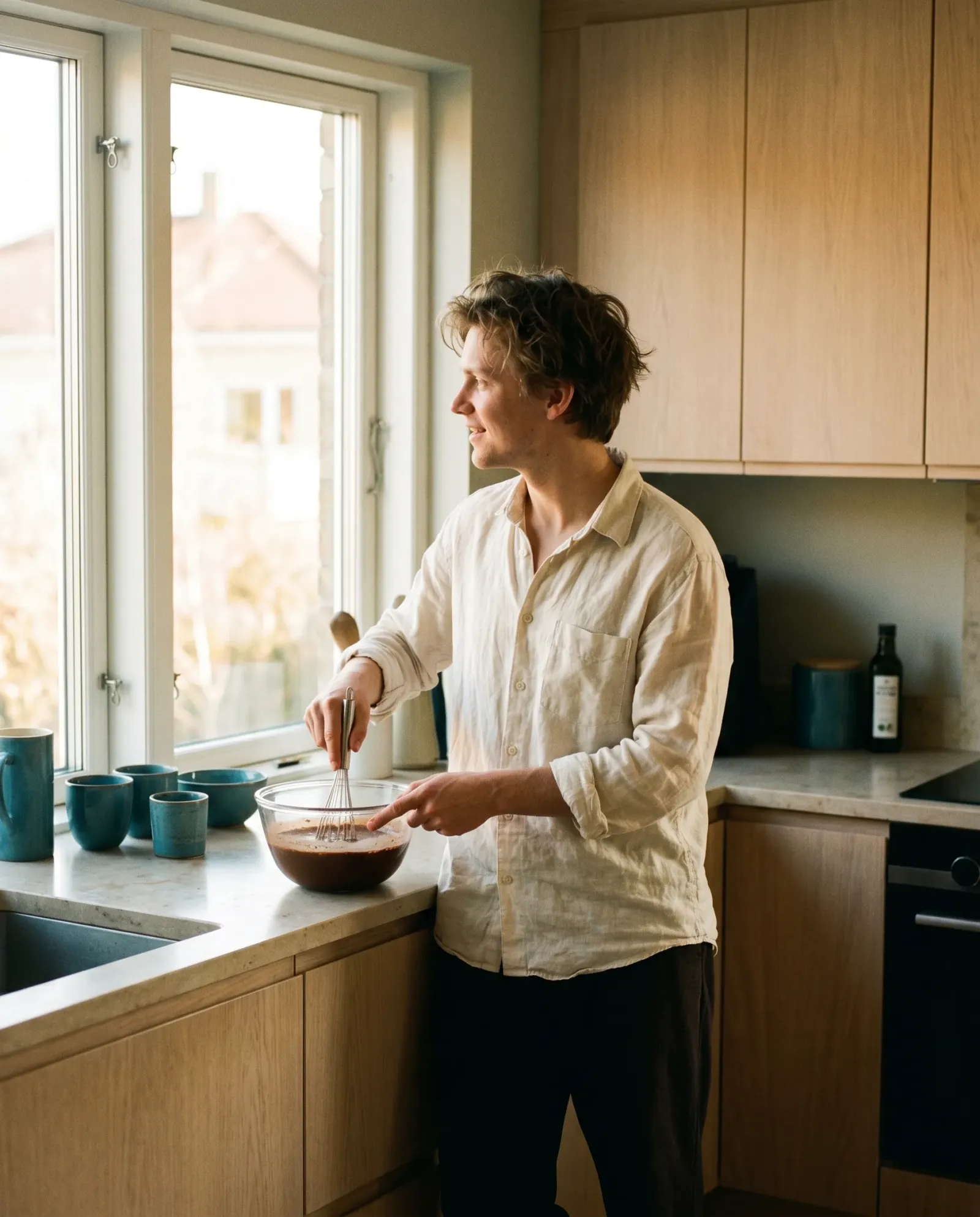 Founder blending functional mushrooms into a morning cacao in a Stockholm kitchen