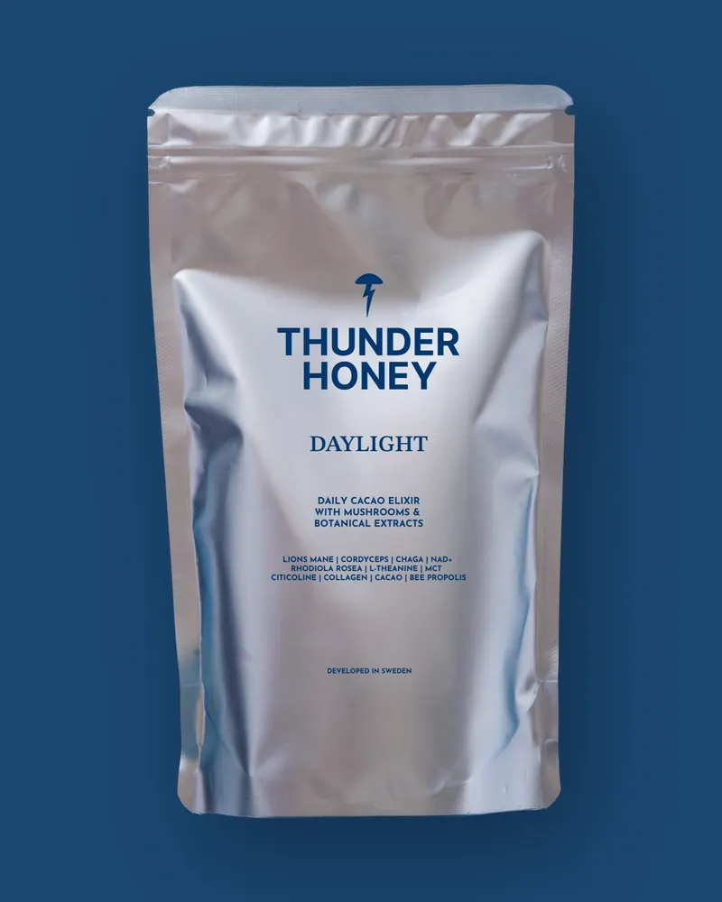 The Thunder Honey Daylight pouch on a navy background