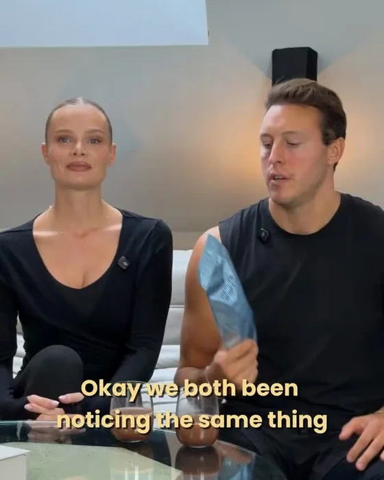 A woman and a man on a sofa talking to the camera, one holding a silver pouch, with the words Okay, we both been noticing the same thing