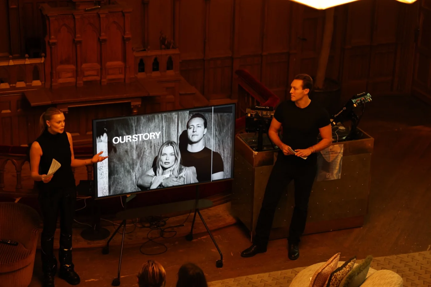 Nina Strauss and Joakim Bjarke on stage, telling the Thunder Honey story to a seated audience