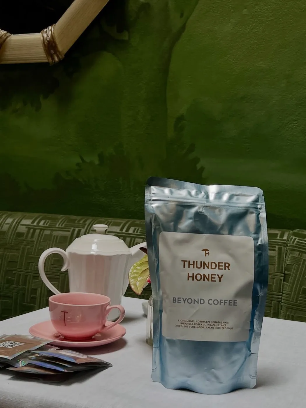 Thunder Honey pouch and branded teacup at a partner café
